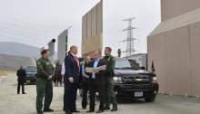 Donald Trump inspects border wall prototypes in San Diego, California. Photograph: Mandel Ngan/AFP/Getty